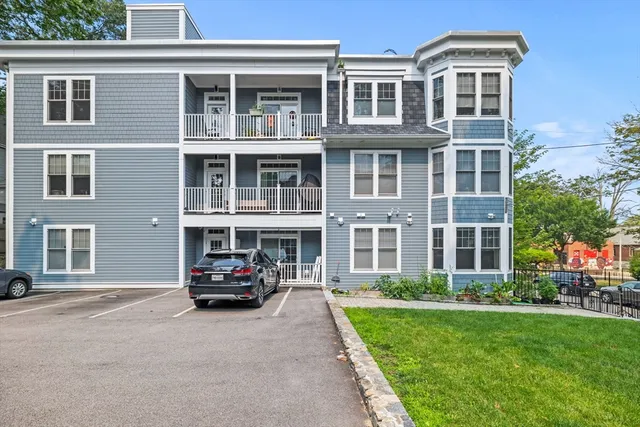 a car parked in front of a building