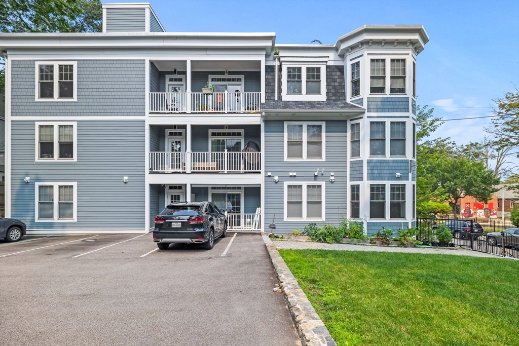 176 Humboldt Avenue, Unit 2 Boston, MA 02121 - Photo 23 of 23 a car parked in front of a building