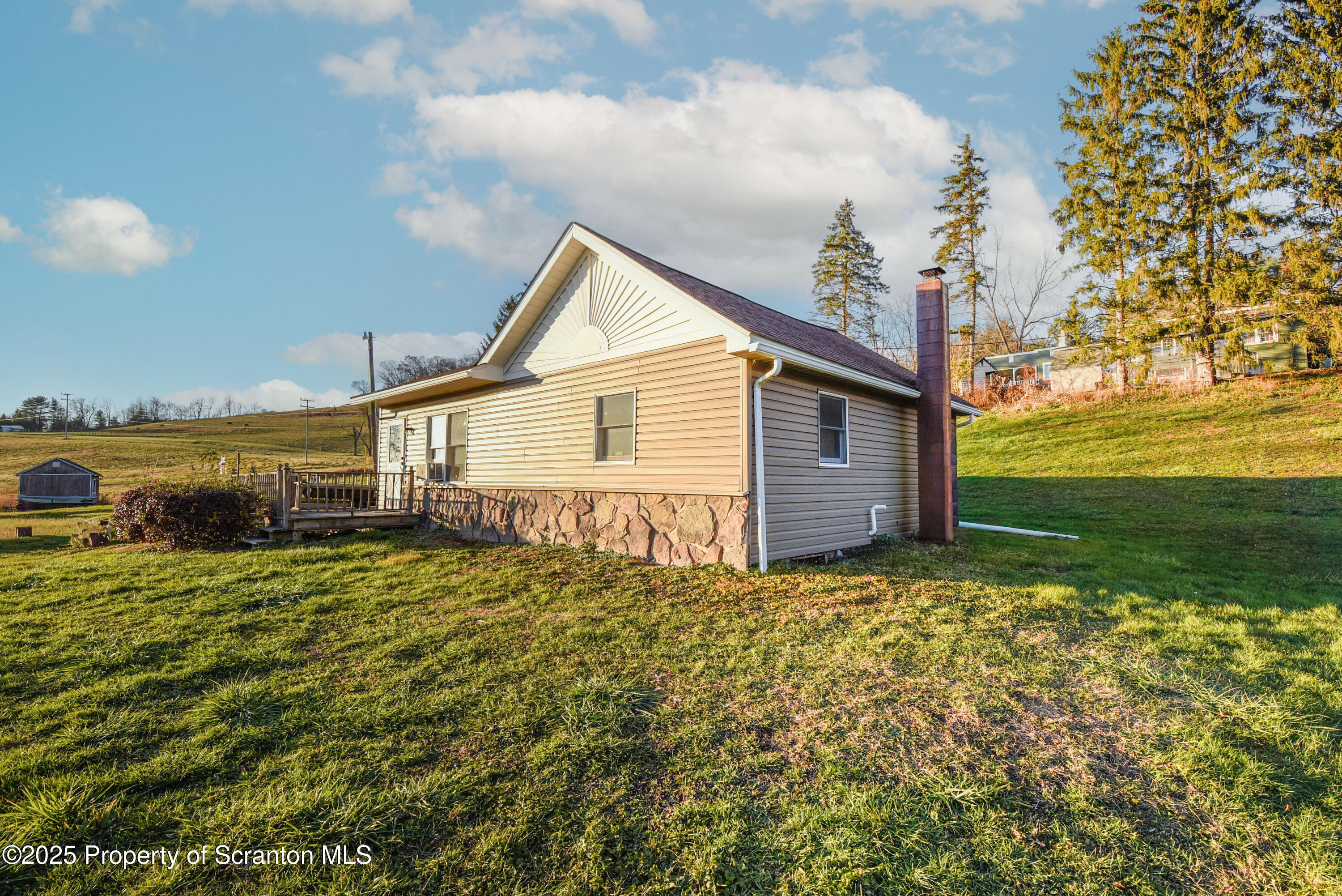 6193 Highway 87 Tunkhannock, PA 18657 - Photo 13 of 41 a view of a house with backyard