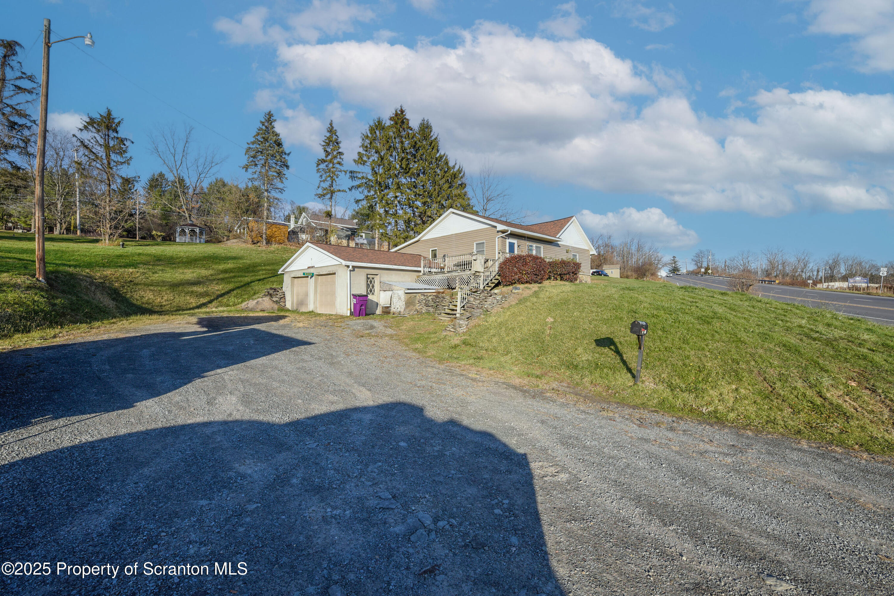6193 Highway 87 Tunkhannock, PA 18657 - Photo 2 of 41 a view of a big yard with potted plants