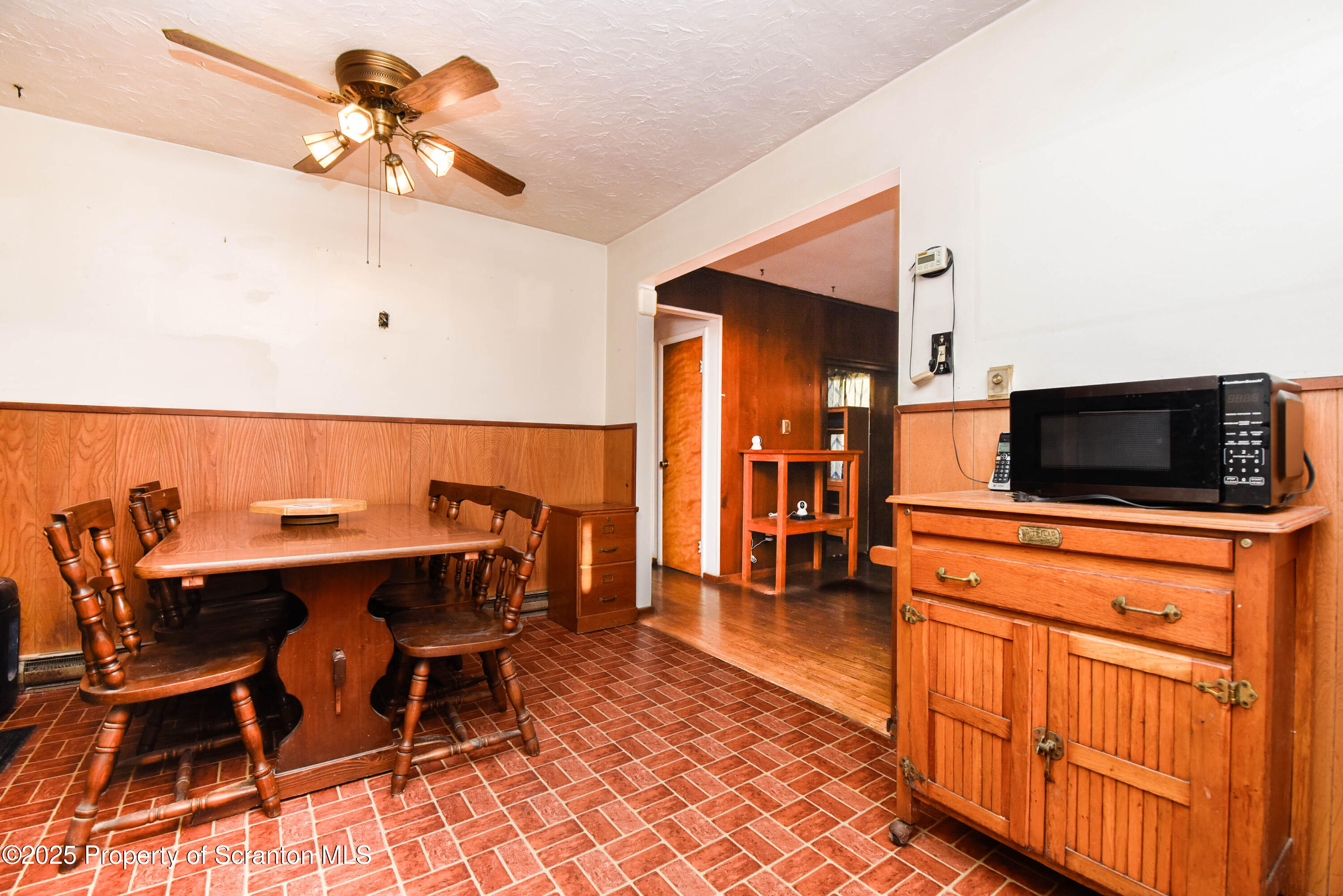 6193 Highway 87 Tunkhannock, PA 18657 - Photo 22 of 41 a view of a dining room with furniture and wooden floor