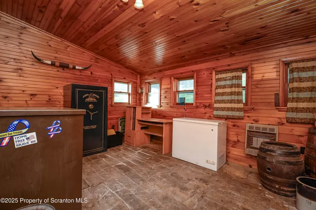 a kitchen with stove and refrigerator