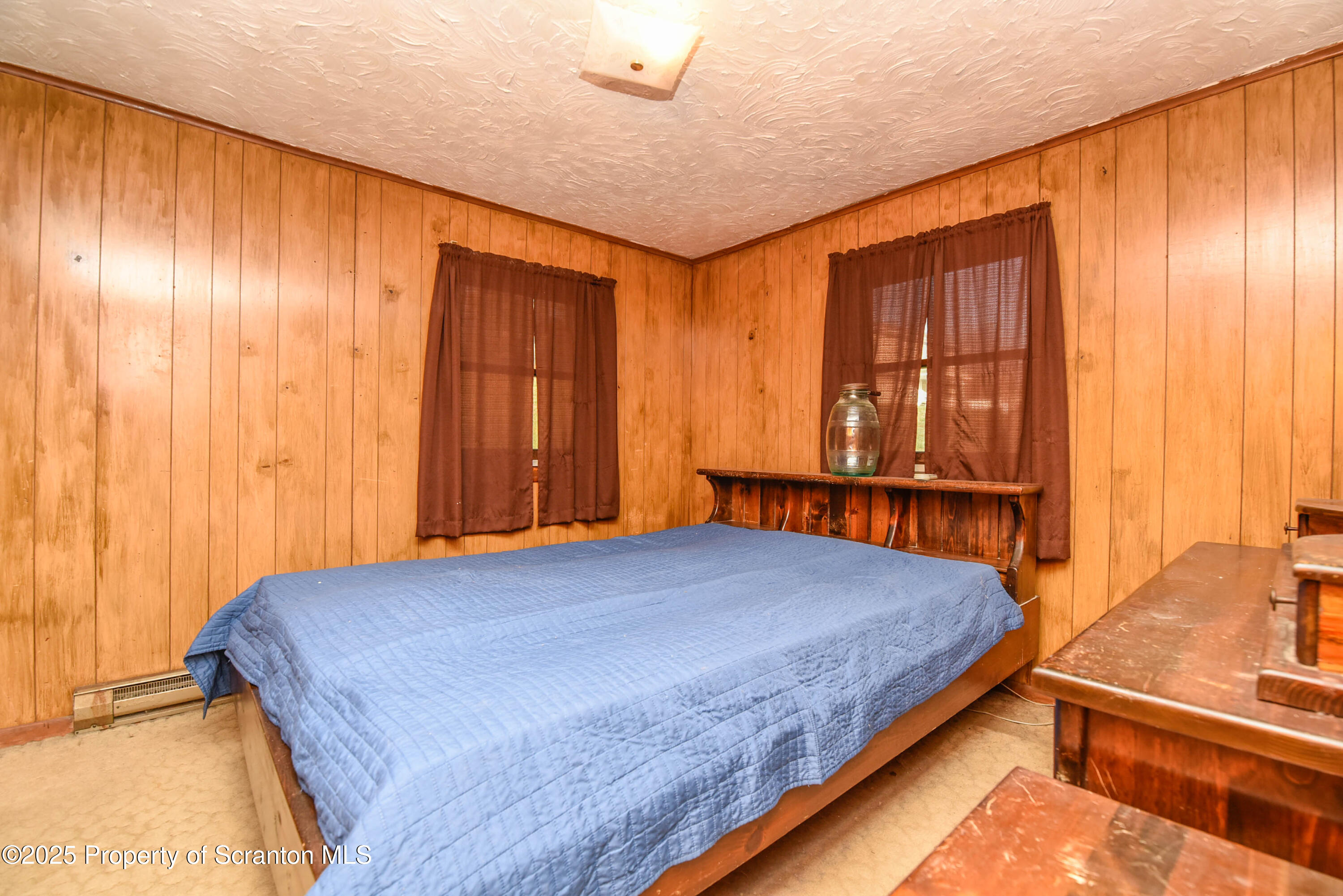 6193 Highway 87 Tunkhannock, PA 18657 - Photo 30 of 41 a bedroom with a bed and a window
