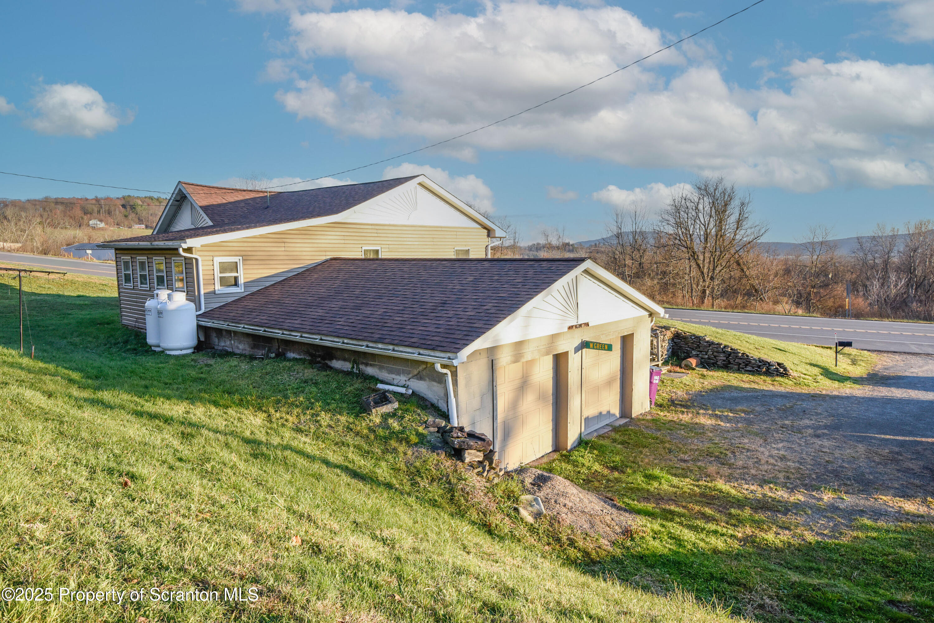 6193 Highway 87 Tunkhannock, PA 18657 - Photo 4 of 41 a view of a house with a yard