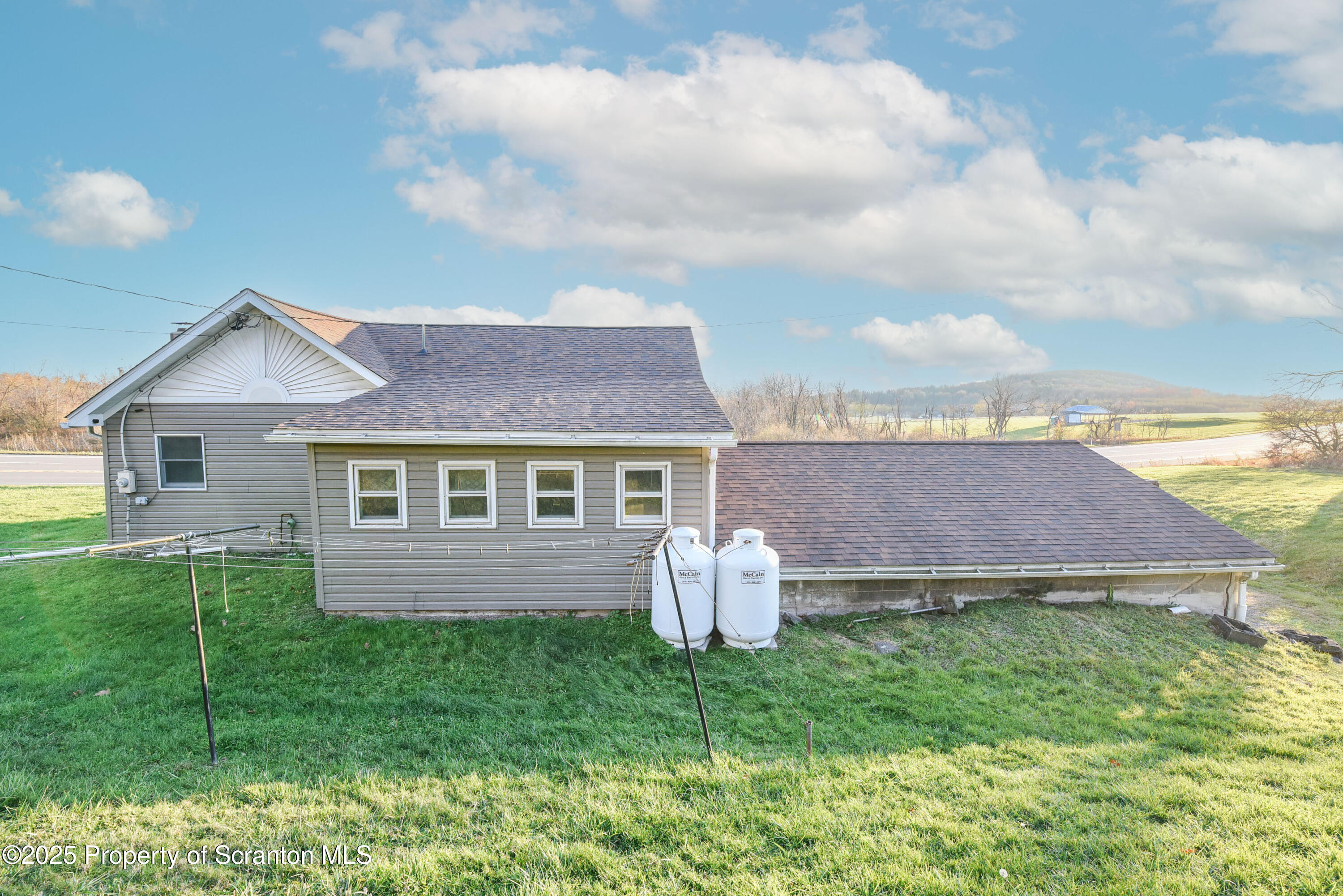 6193 Highway 87 Tunkhannock, PA 18657 - Photo 5 of 41 a view of a house with a yard