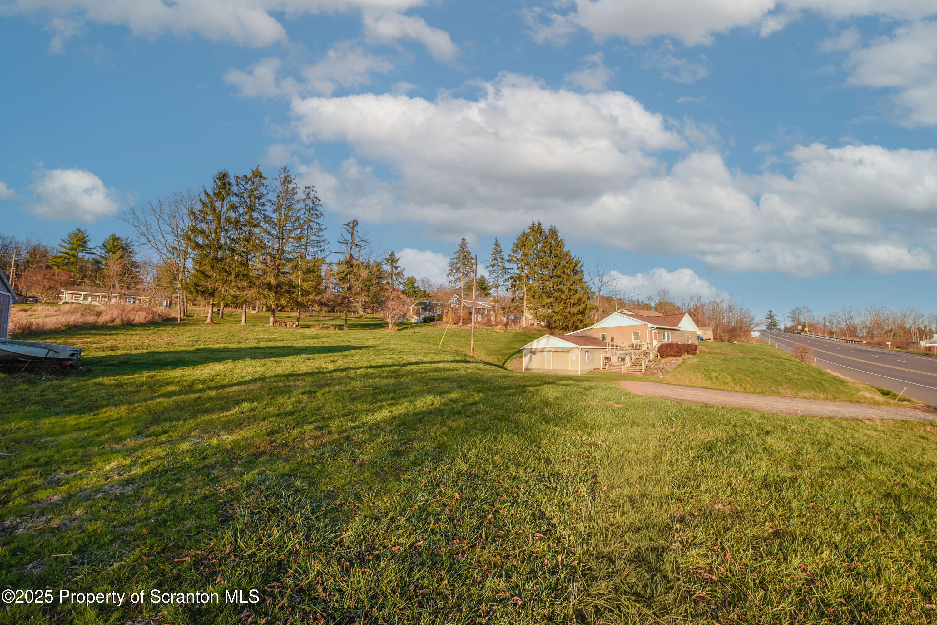 6193 Highway 87 Tunkhannock, PA 18657 - Photo 8 of 41 a view of a houses with outdoor space