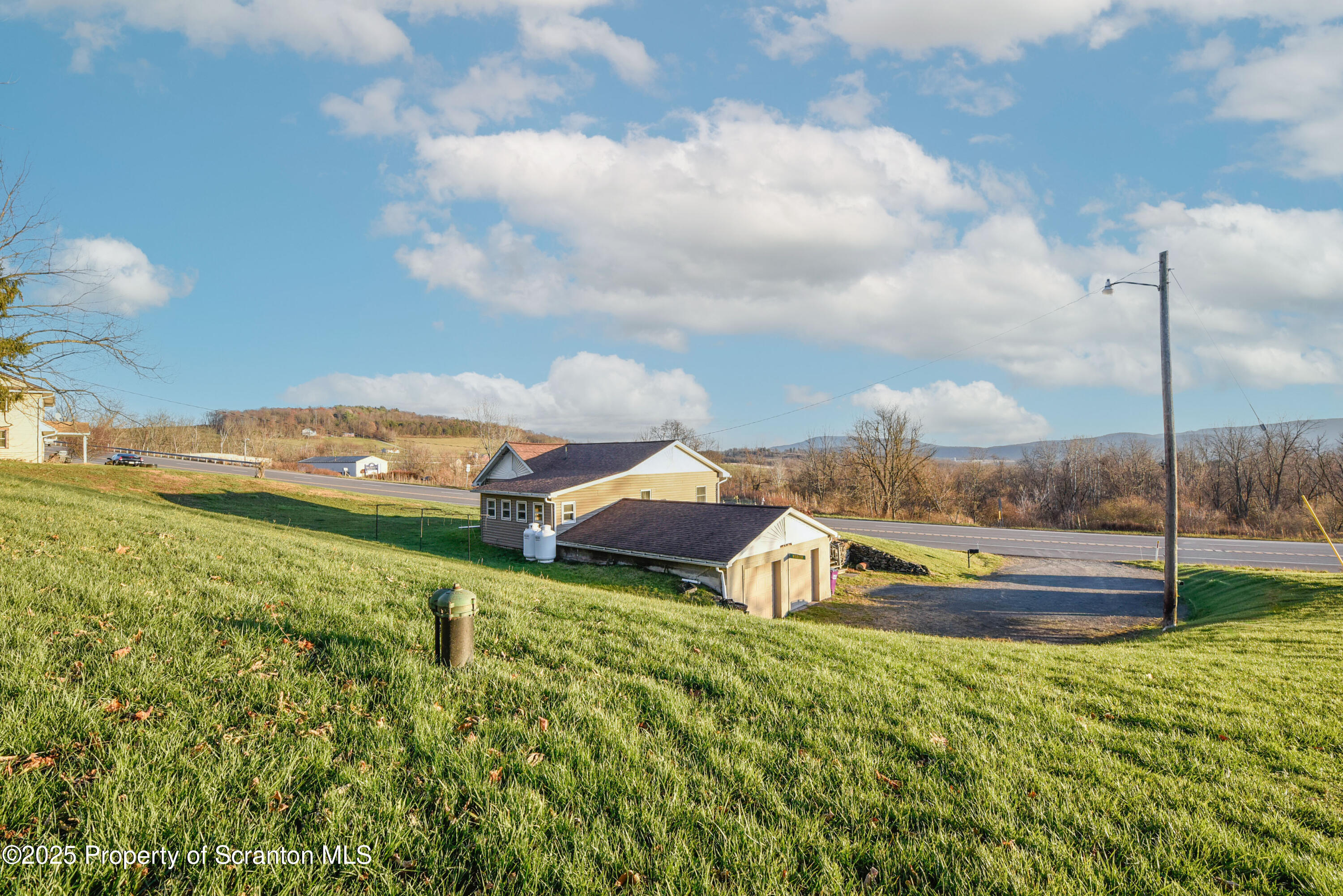 6193 Highway 87 Tunkhannock, PA 18657 - Photo 10 of 41 a view of a houses with a big yard