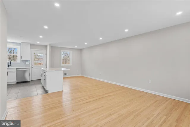 a view of kitchen with wooden floor