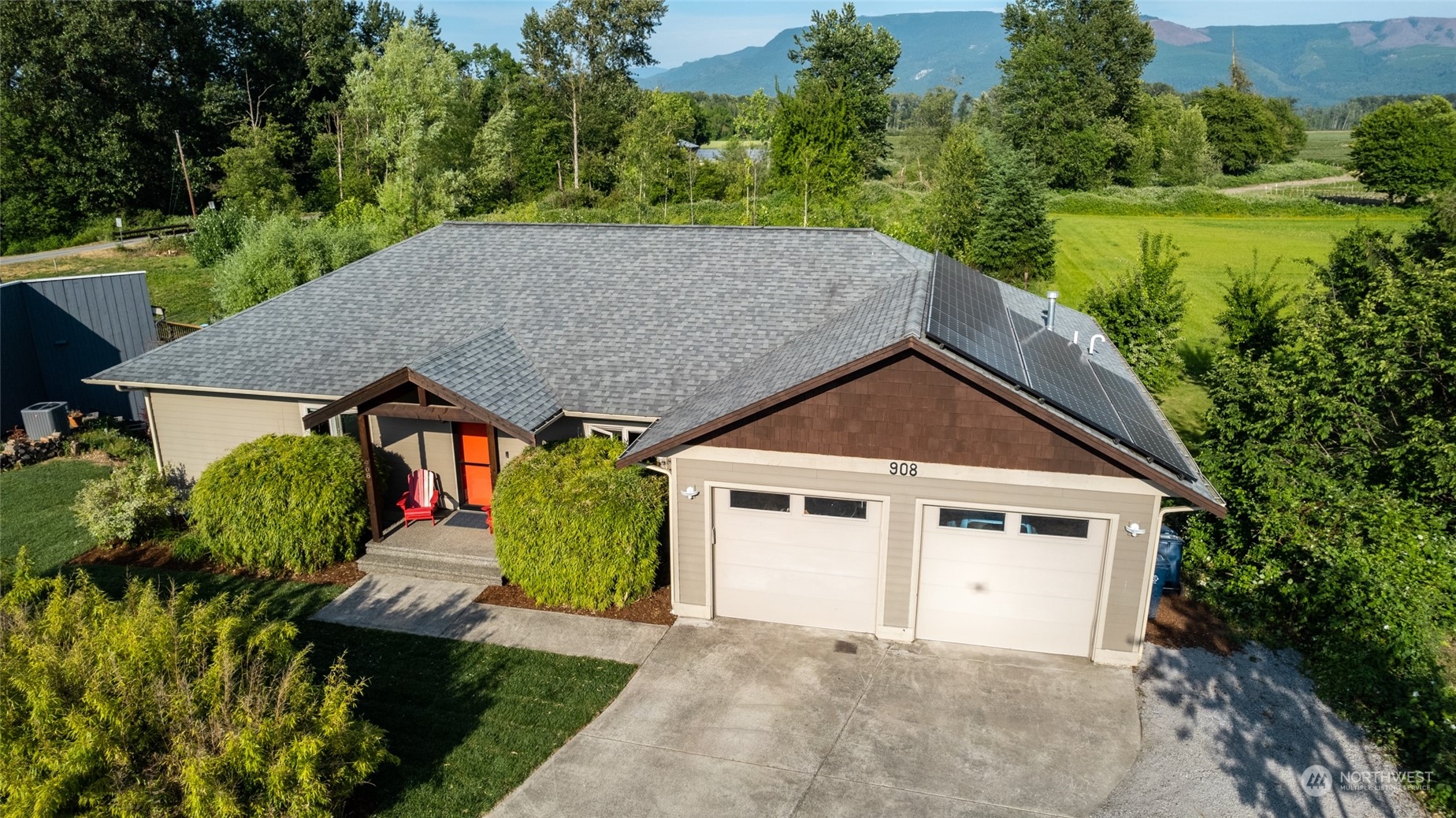 908 Mission Road Everson, WA 98247 - Photo 12 of 40 a view of a house with garden