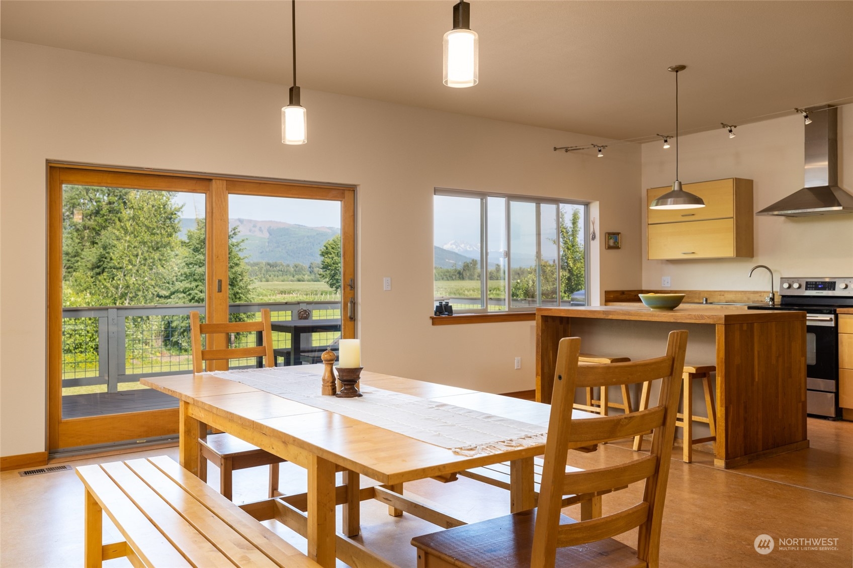908 Mission Road Everson, WA 98247 - Photo 20 of 40 a view of a dining room with furniture window and wooden floor