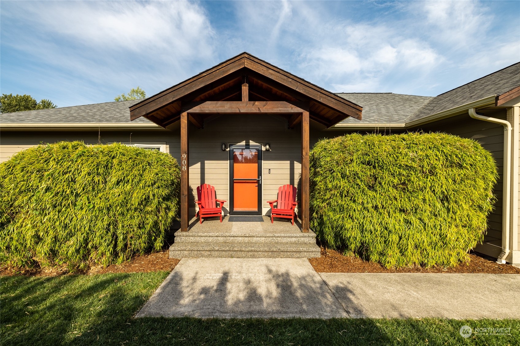 908 Mission Road Everson, WA 98247 - Photo 2 of 40 a front view of a house with garden