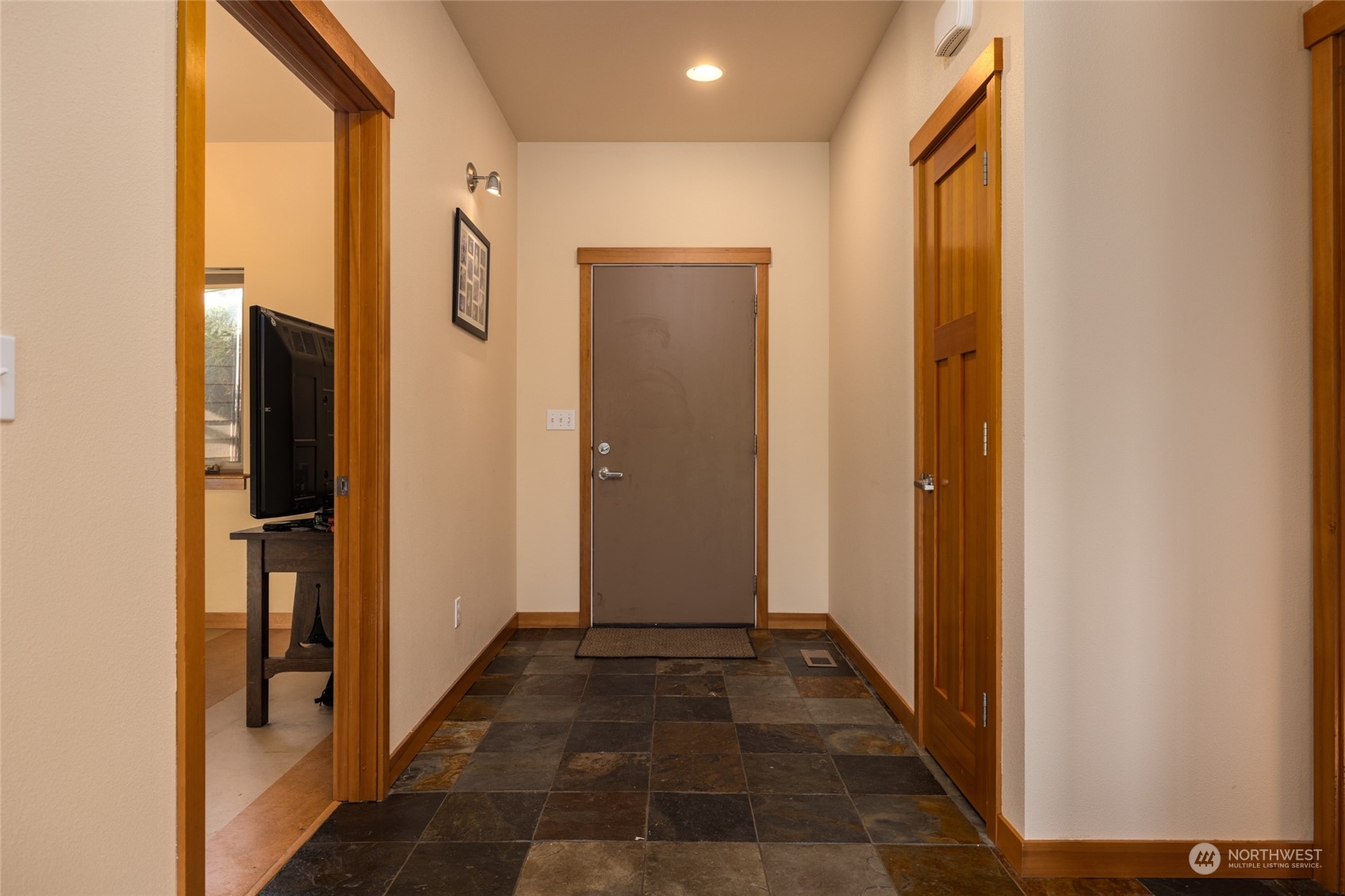 908 Mission Road Everson, WA 98247 - Photo 23 of 40 a view of a hallway with wooden floor