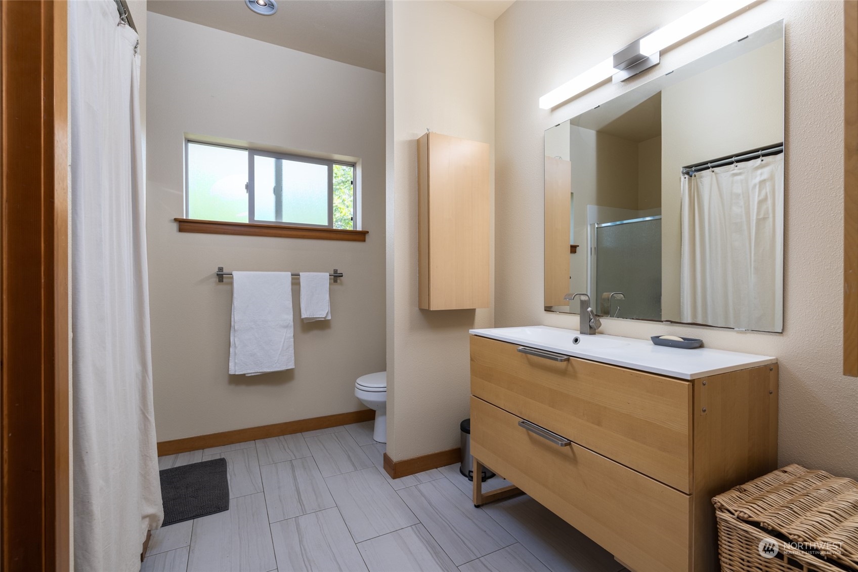 908 Mission Road Everson, WA 98247 - Photo 27 of 40 a bathroom with a sink and a mirror
