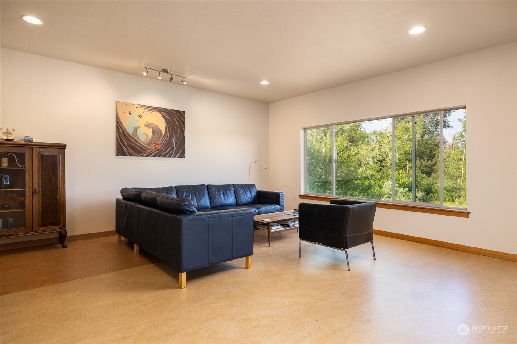908 Mission Road Everson, WA 98247 - Photo 31 of 40 a living room with furniture and a large window