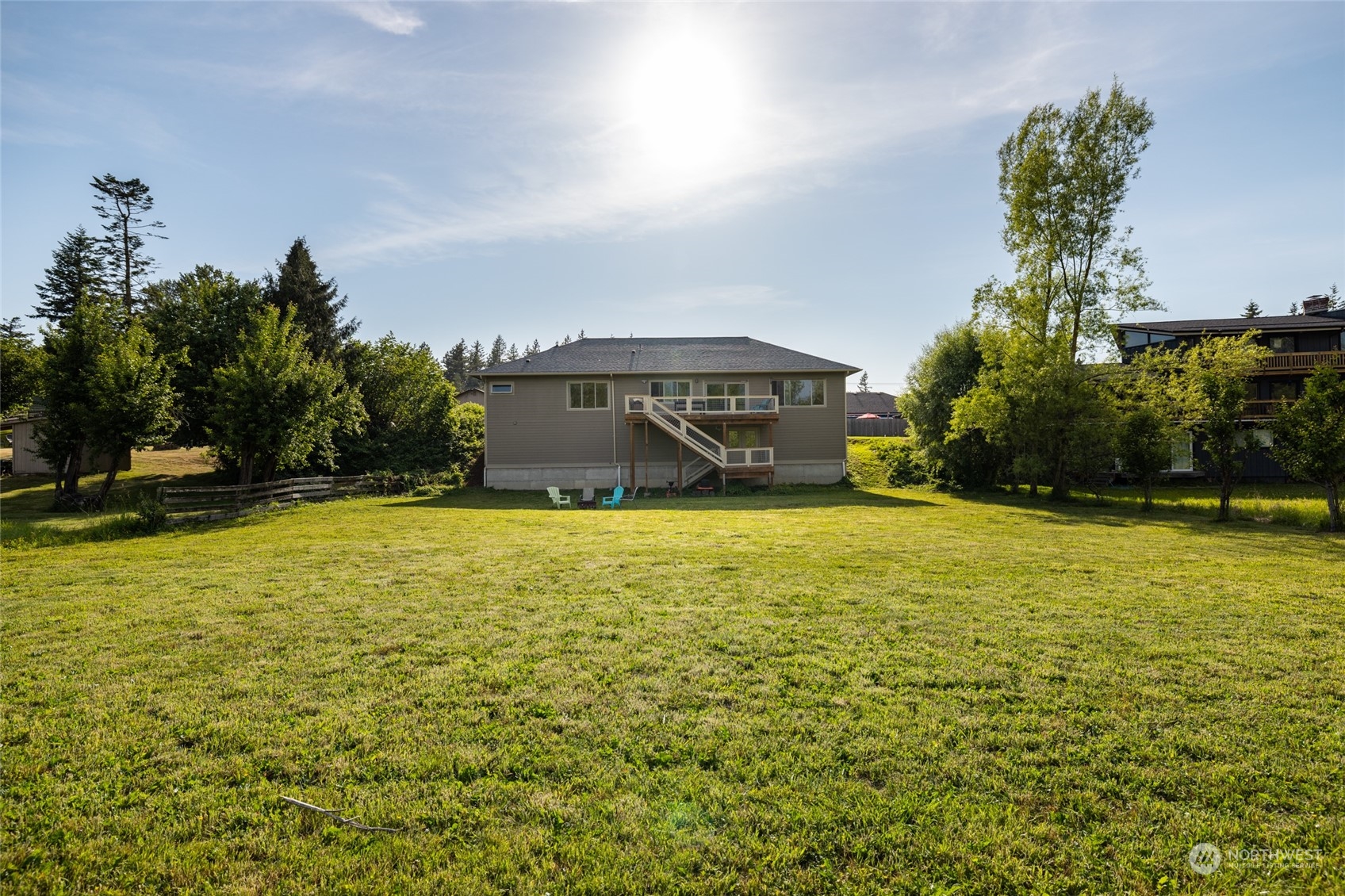 908 Mission Road Everson, WA 98247 - Photo 7 of 40 a view of a swimming pool with an outdoor space and seating area