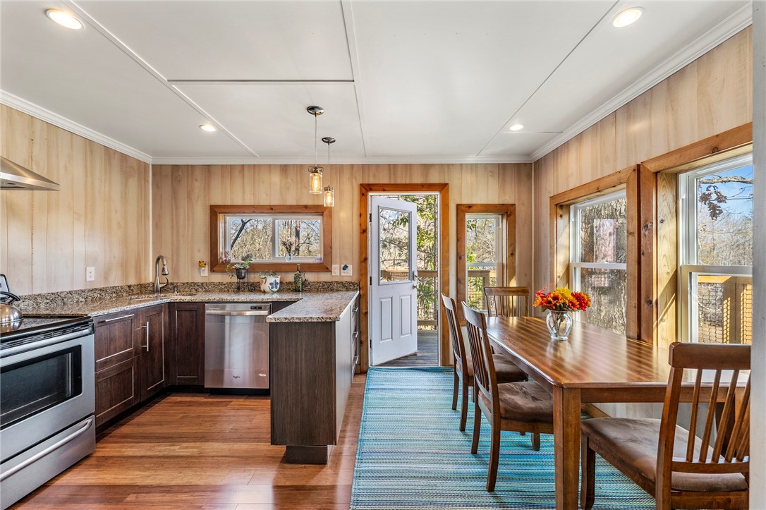 187 Teri Drive Liberty, SC 29657 - Photo 36 of 50 Kitchen and dining table in the tree house.