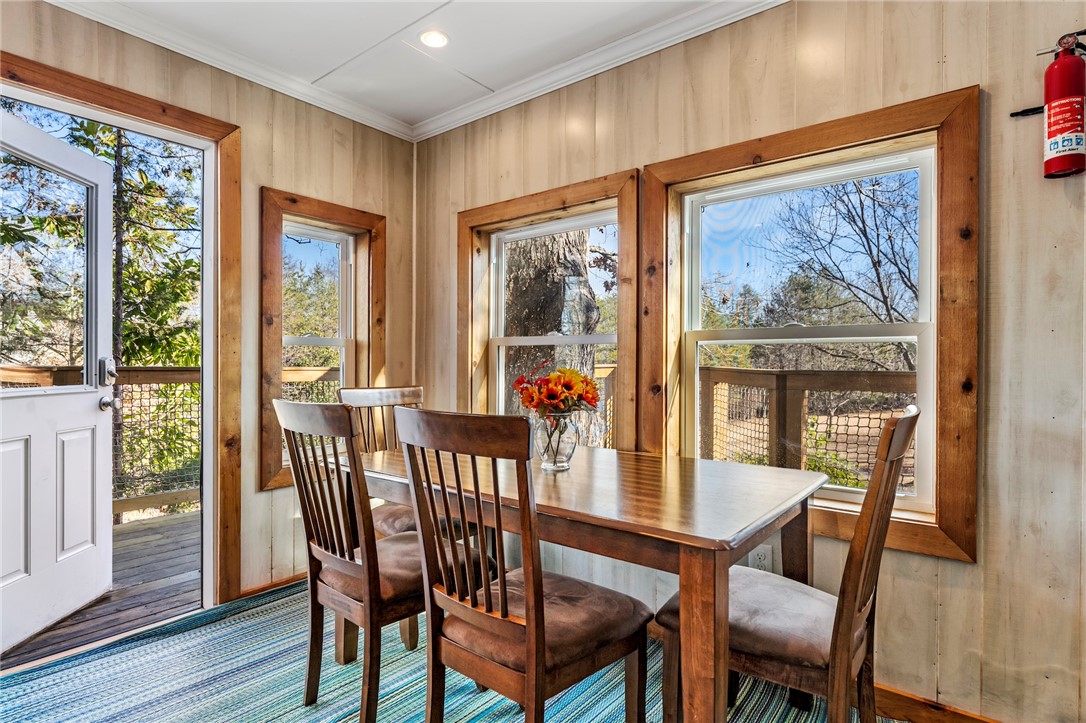 187 Teri Drive Liberty, SC 29657 - Photo 37 of 50 Dining are in tree house. Abundance of natural light.