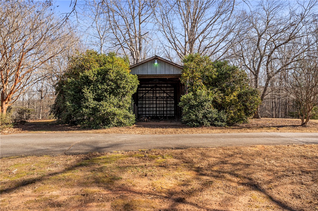 187 Teri Drive Liberty, SC 29657 - Photo 45 of 50 Very cool barn on the property. Could house horses with proper configuration, serve as an event space or be a backdrop for photographers to photograph clients. Endless possibilities and potential extra revenue.