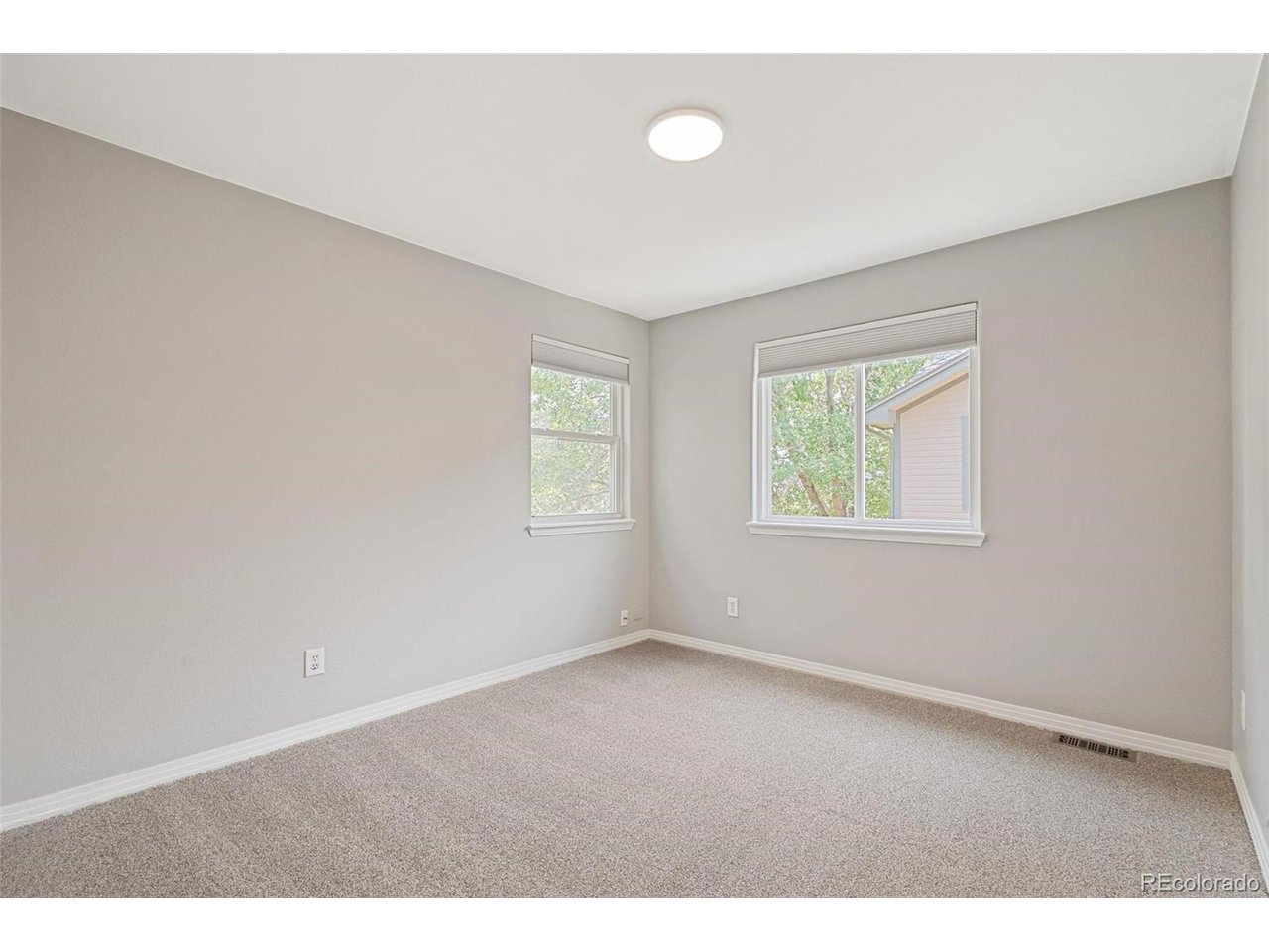 6450 West 44th Place, Unit B Wheat Ridge, CO 80033 - Photo 17 of 35 Large Guest Bedroom
