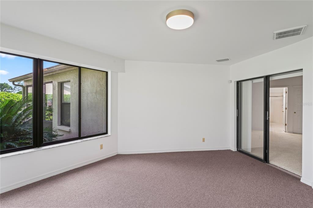 9108 Bassett Lane, Unit B New Port Richey, FL 34655 - Photo 21 of 66 an empty room with window