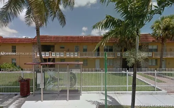 a view of swimming pool from a yard