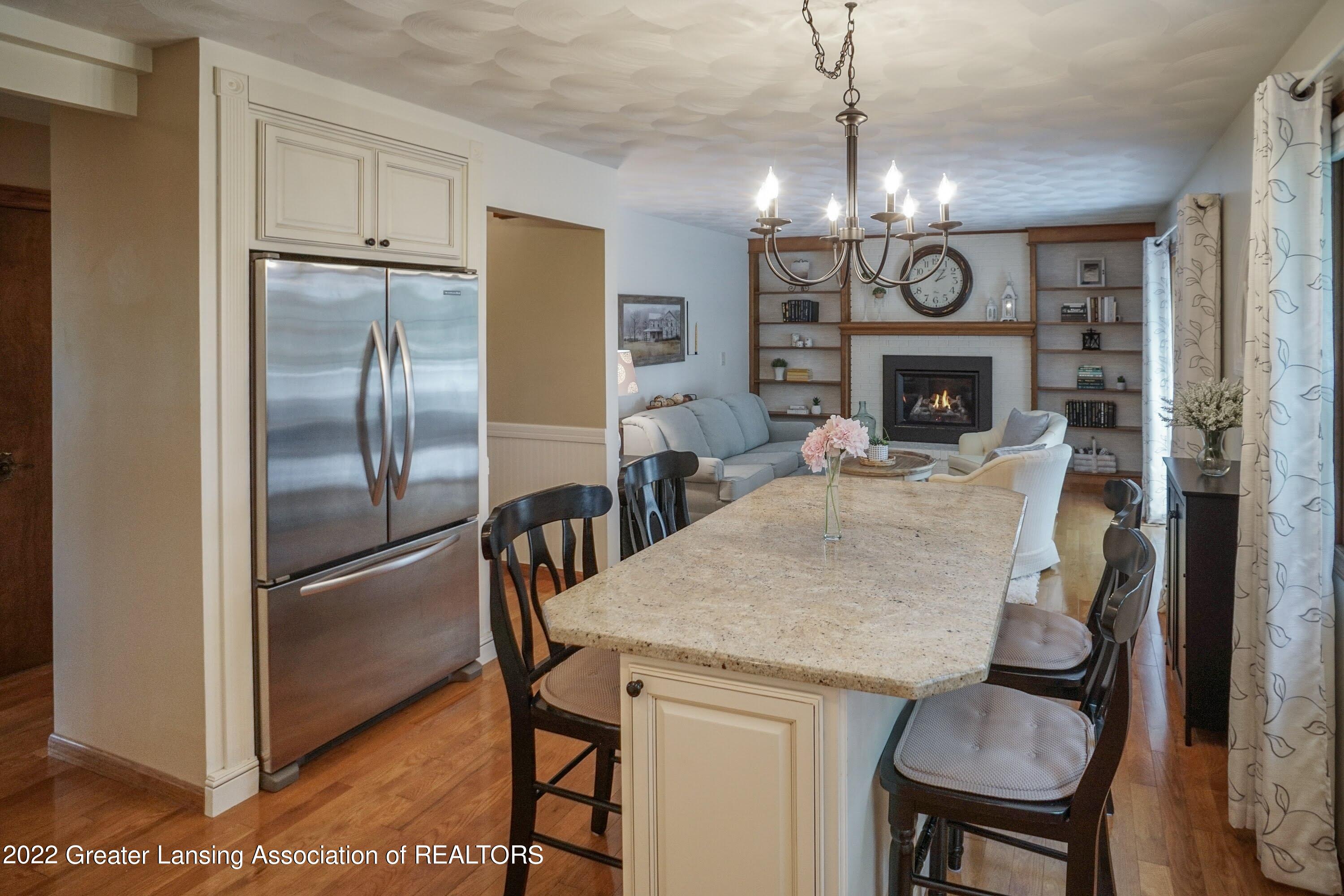 945 Kingsbridge Road Grand Ledge, MI 48837 - Photo 11 of 57 Kitchen to den