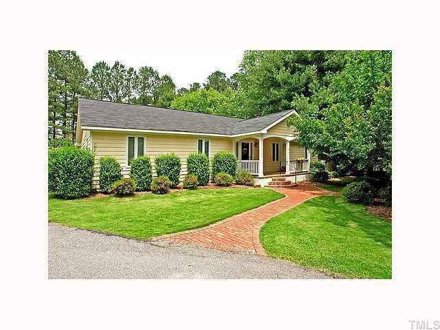 a house view with a garden space