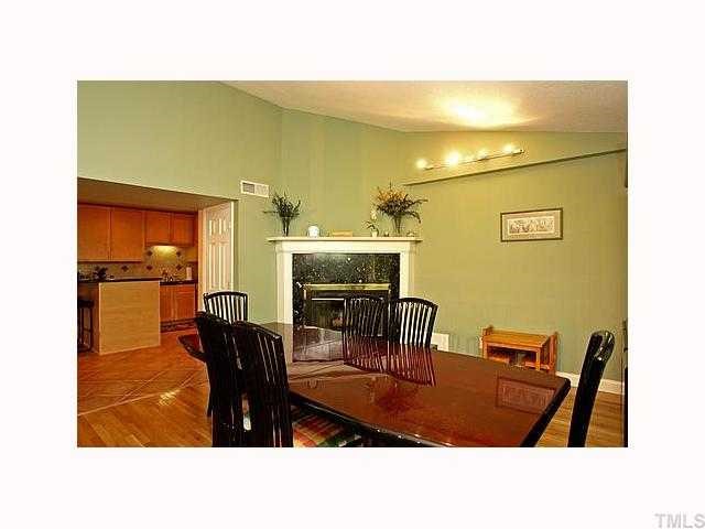 814 Tyrrell Road Raleigh, NC 27609 - Photo 3 of 12 a dining room with furniture