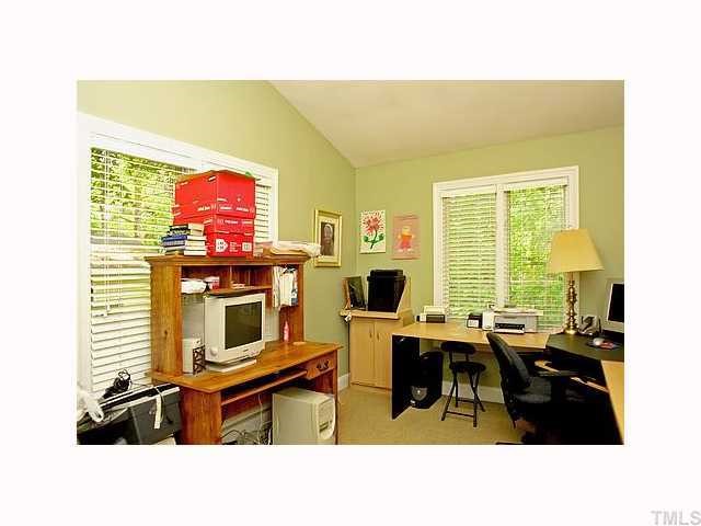 814 Tyrrell Road Raleigh, NC 27609 - Photo 10 of 12 a living room with furniture window and flat screen tv