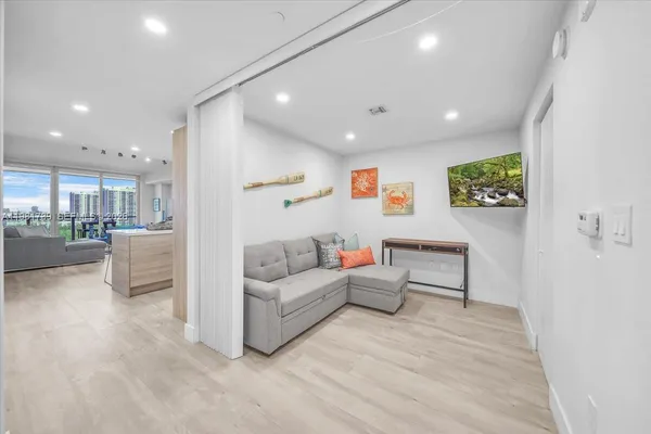 a bathroom with a shower and a sink