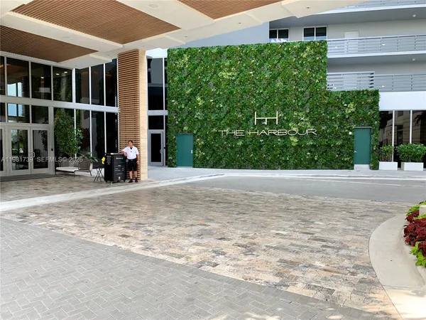a outdoor space with lots of furniture and a potted plant