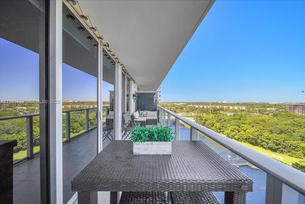 a spacious bathroom with a double vanity sink a mirror and a shower