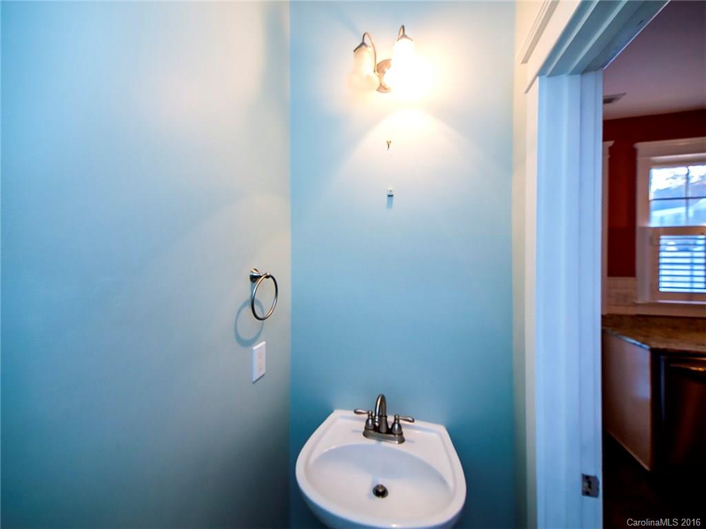 298 Elis Way, Unit 298 Fort Mill, SC 29708 - Photo 9 of 19 a bathroom with a sink and mirror