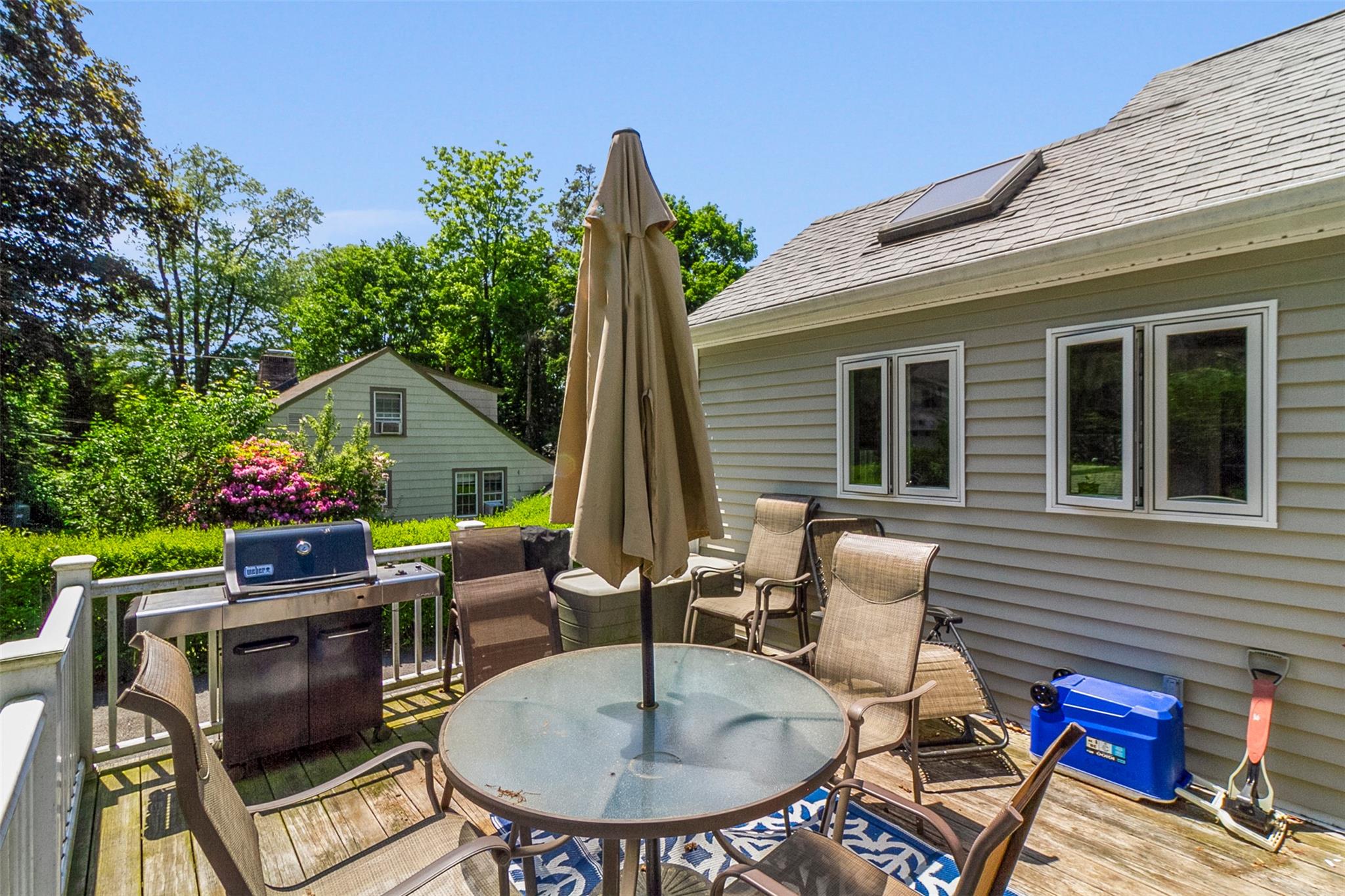 39 Woodland Road Mahopac, NY 10541 - Photo 11 of 21 a backyard of a house with table and chairs