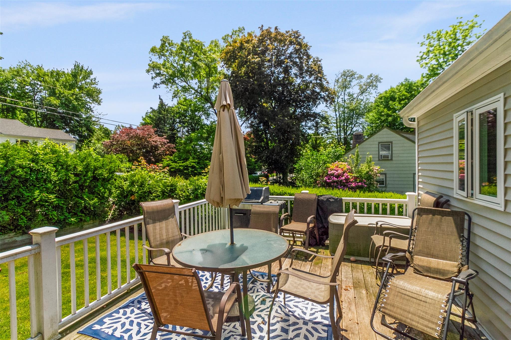 39 Woodland Road Mahopac, NY 10541 - Photo 3 of 21 a view of a chairs and table in the patio