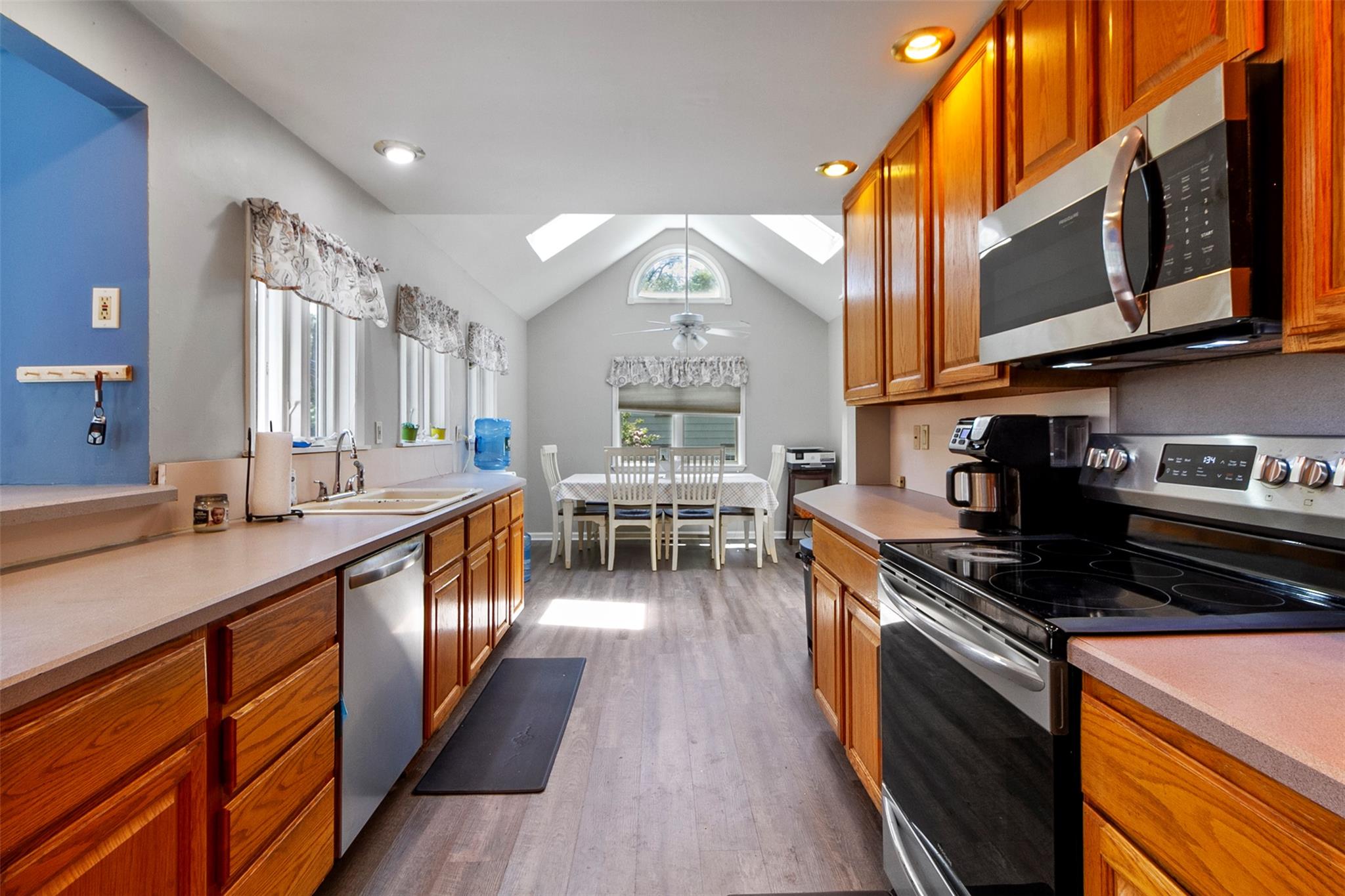 39 Woodland Road Mahopac, NY 10541 - Photo 4 of 21 a kitchen with stainless steel appliances granite countertop a stove and a sink