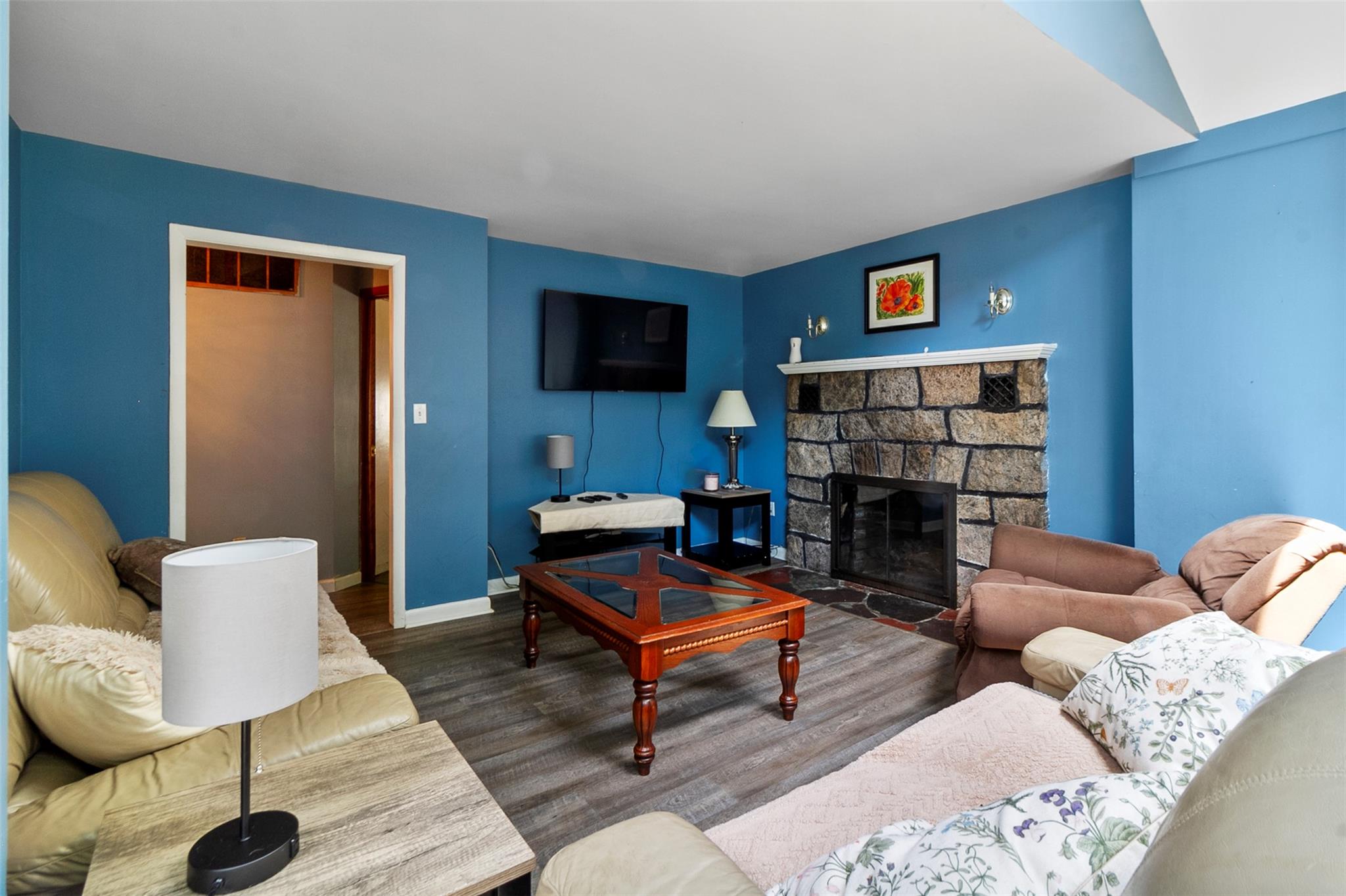 39 Woodland Road Mahopac, NY 10541 - Photo 7 of 21 a living room with furniture a rug and a fireplace