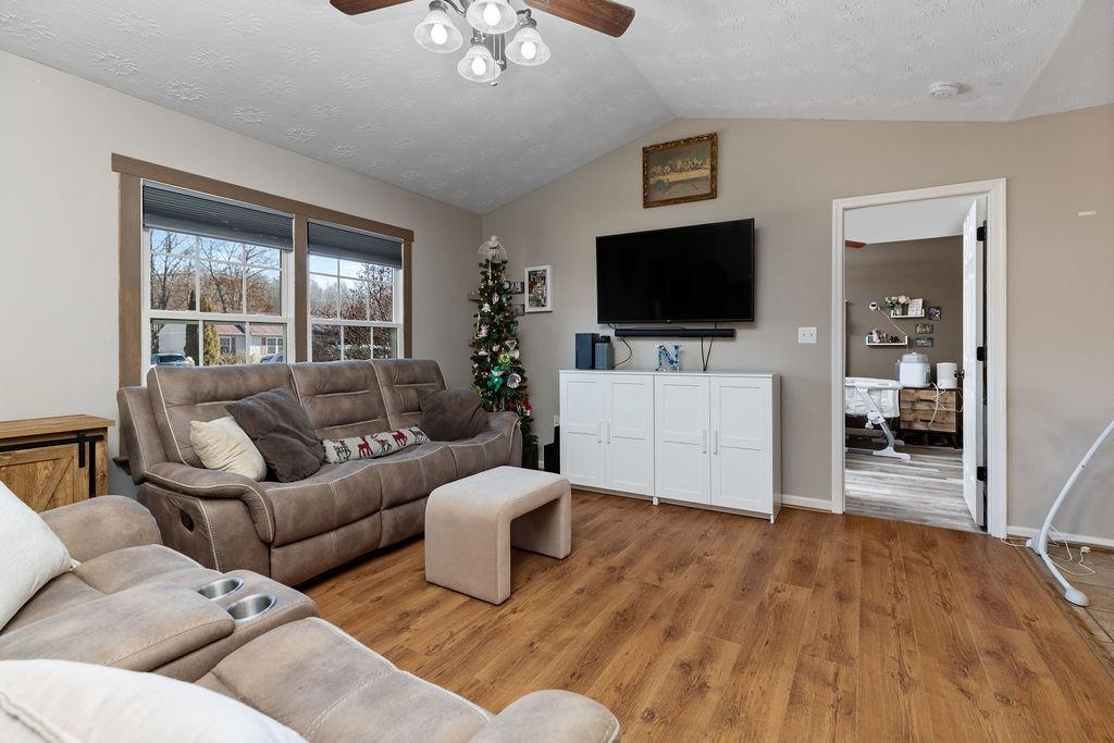 149 China Clay Road Stuarts Draft, VA 24477 - Photo 6 of 22 a living room with furniture and a flat screen tv