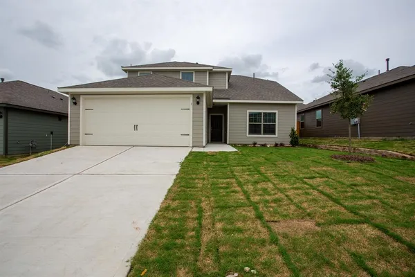 a front view of house with yard