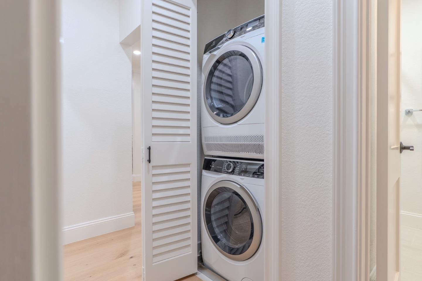 22330 Homestead Road, Unit 116 Cupertino, CA 95014 - Photo 19 of 30 a utility room with dryer and washer