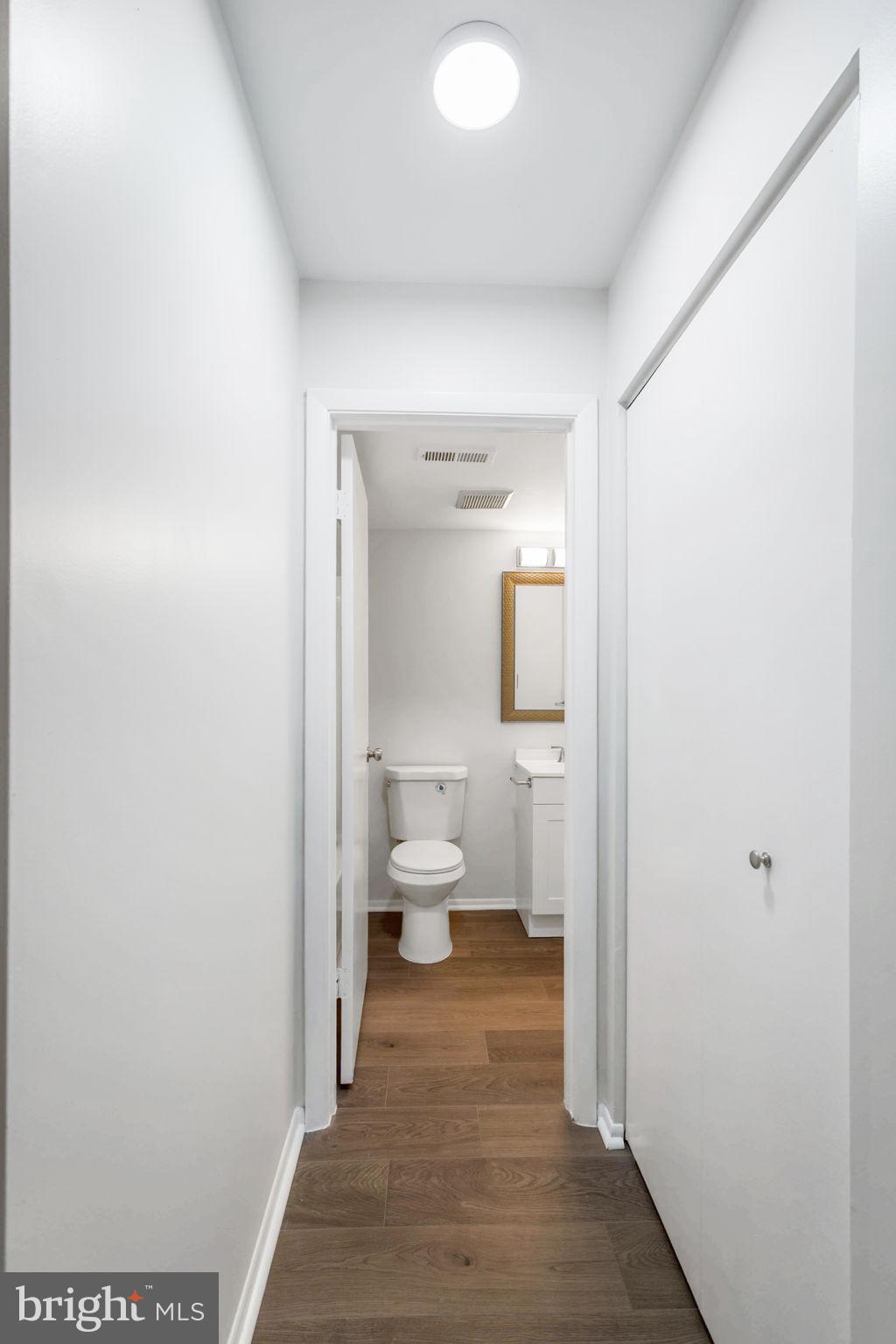 1104 Lisadale Circle, Unit 1D Baltimore, MD 21228 - Photo 21 of 35 primary hallway to ensuite