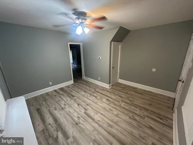 a view of a livingroom with wooden floor