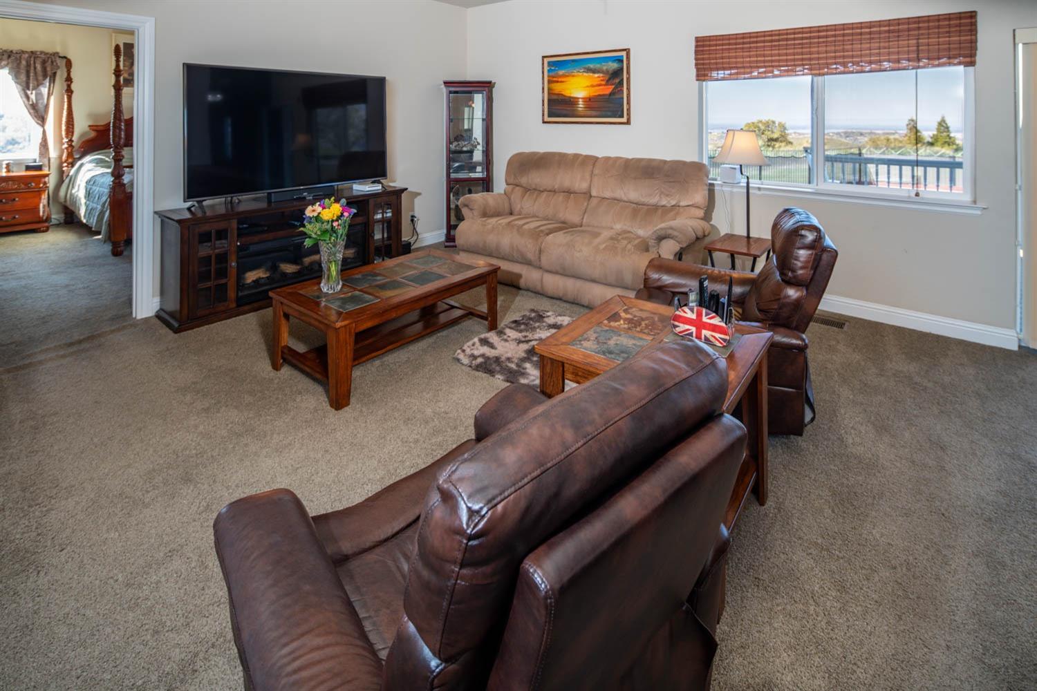 2661 Mountain Oak Lane Rescue, CA 95672 - Photo 26 of 88 Living room with lake views