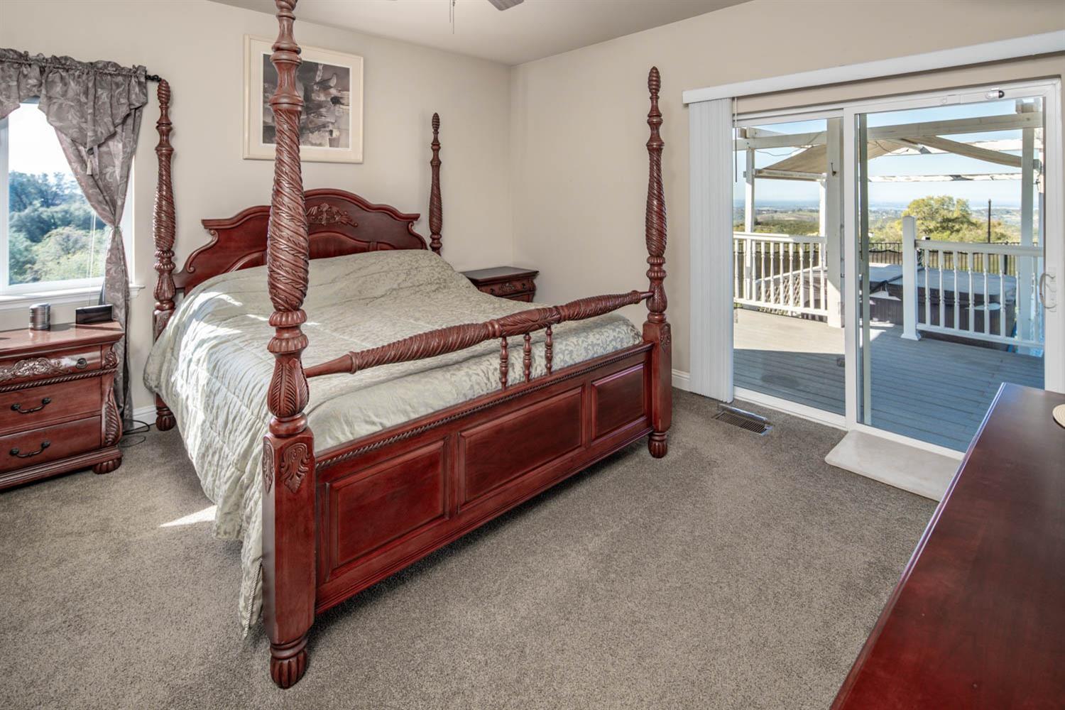 2661 Mountain Oak Lane Rescue, CA 95672 - Photo 30 of 88 Primary bedroom on main floss with private outside access and lake views