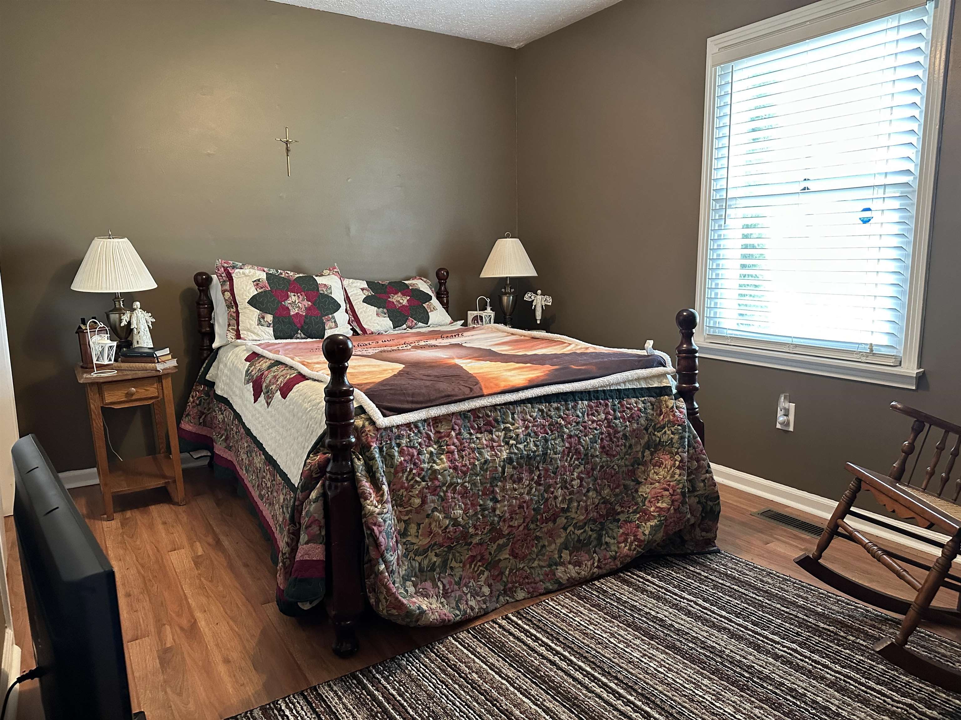 92 Puron Road Adamsville, TN 38310 - Photo 15 of 23 a bed room with a bed and a window