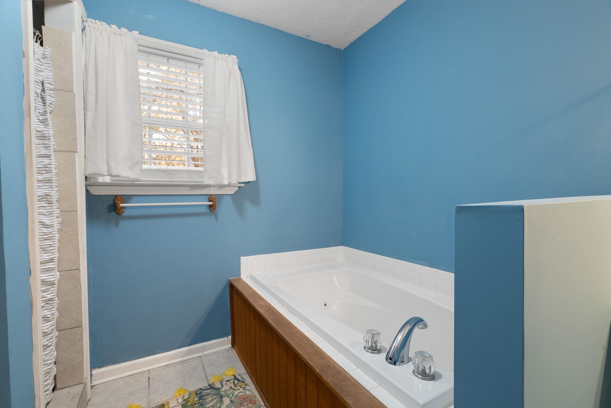 310 Liberty Road Moscow, TN 38057 - Photo 18 of 32 a view of bathroom with window and washer