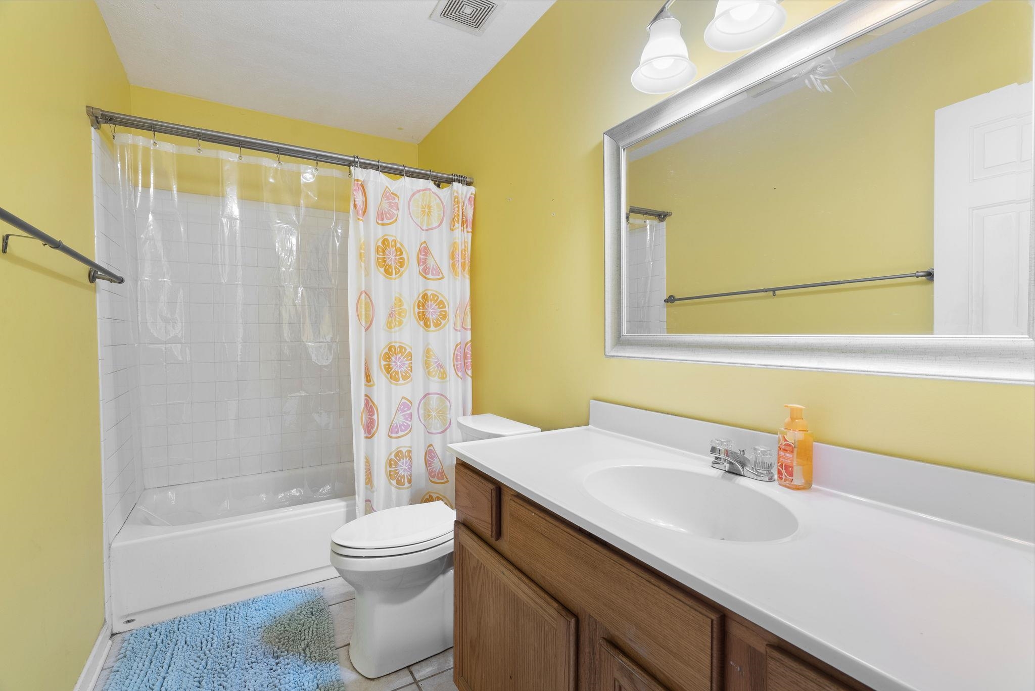 310 Liberty Road Moscow, TN 38057 - Photo 23 of 32 a bathroom with a sink a toilet and a bathtub