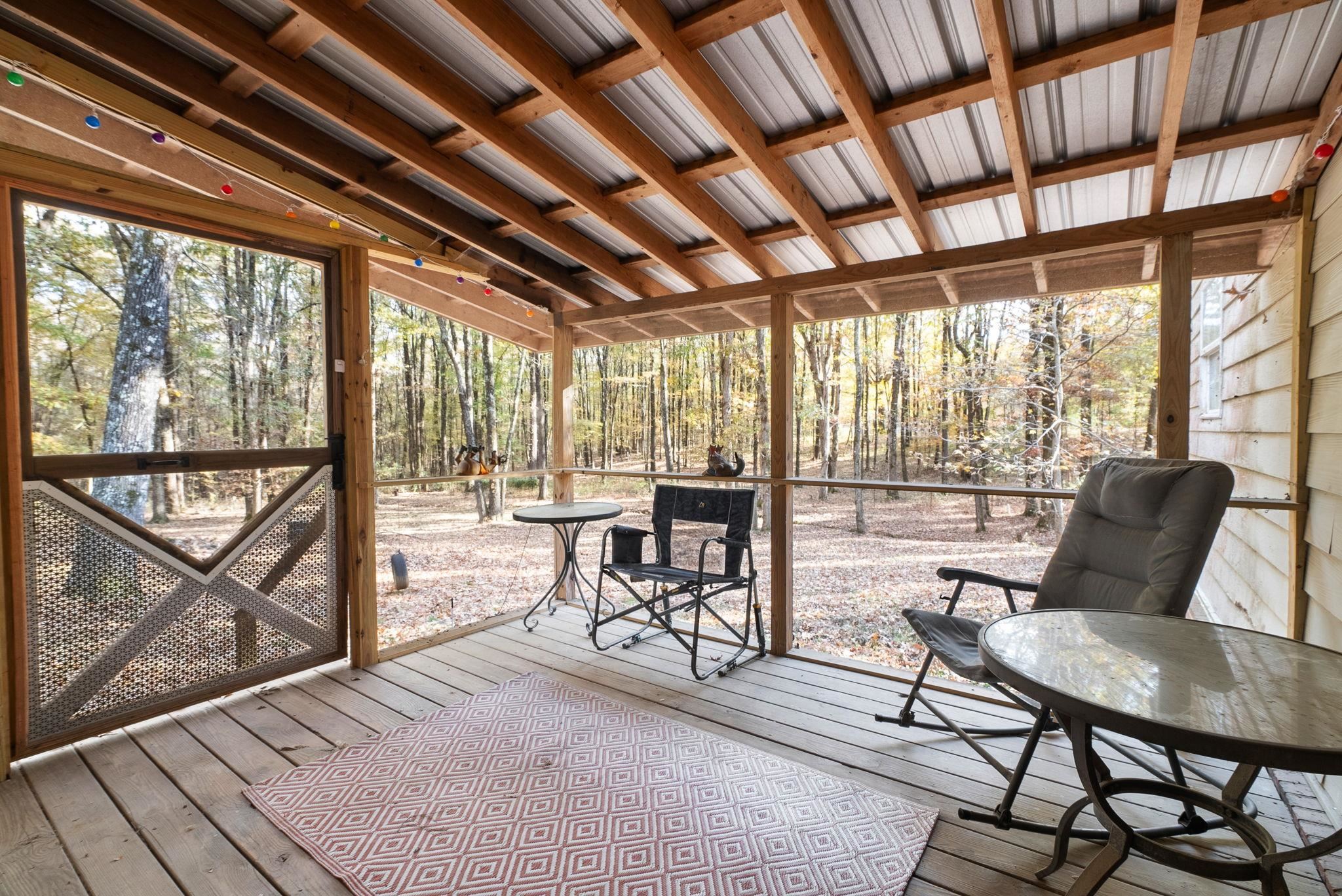 310 Liberty Road Moscow, TN 38057 - Photo 24 of 32 a living room with furniture and a floor to ceiling window