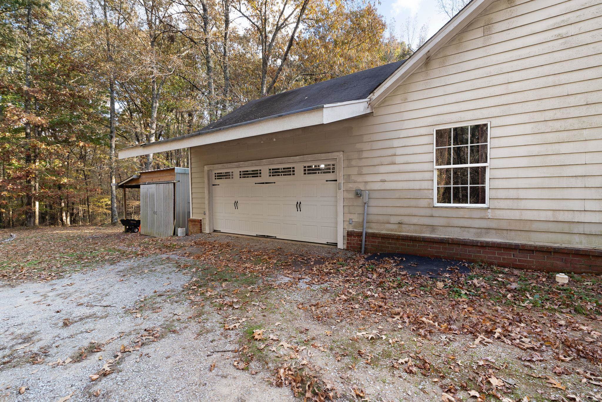 310 Liberty Road Moscow, TN 38057 - Photo 25 of 32 a view of a house with a yard
