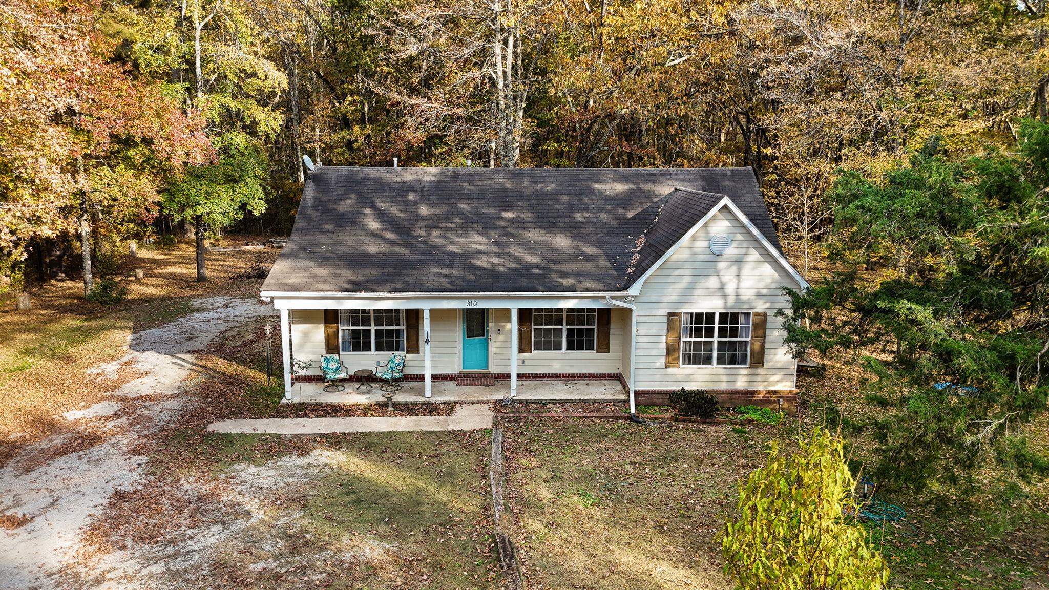 310 Liberty Road Moscow, TN 38057 - Photo 28 of 32 front view of a house with a yard
